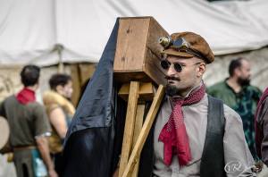 This is one of the most original Steampunk costumes we've found on our world tour. Understated yet distinctive. We wonder if the camera actually works?